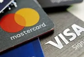 اتفاق تاريخي بين “فيزا” و”ماستركارد” لخفض رسوم التجار الأمريكيين