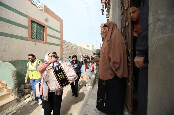 جمعية البنك الأهلي المصري للأعمال الخيرية تطلق مبادرة لتوزيع 1000 بطانية بالفيوم - أموال الغد