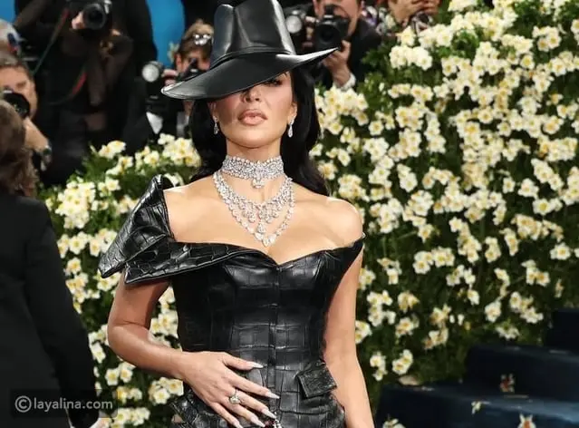 لقطات رومانسية تجمع بين كيم كارداشيان ولويس هاميلتون