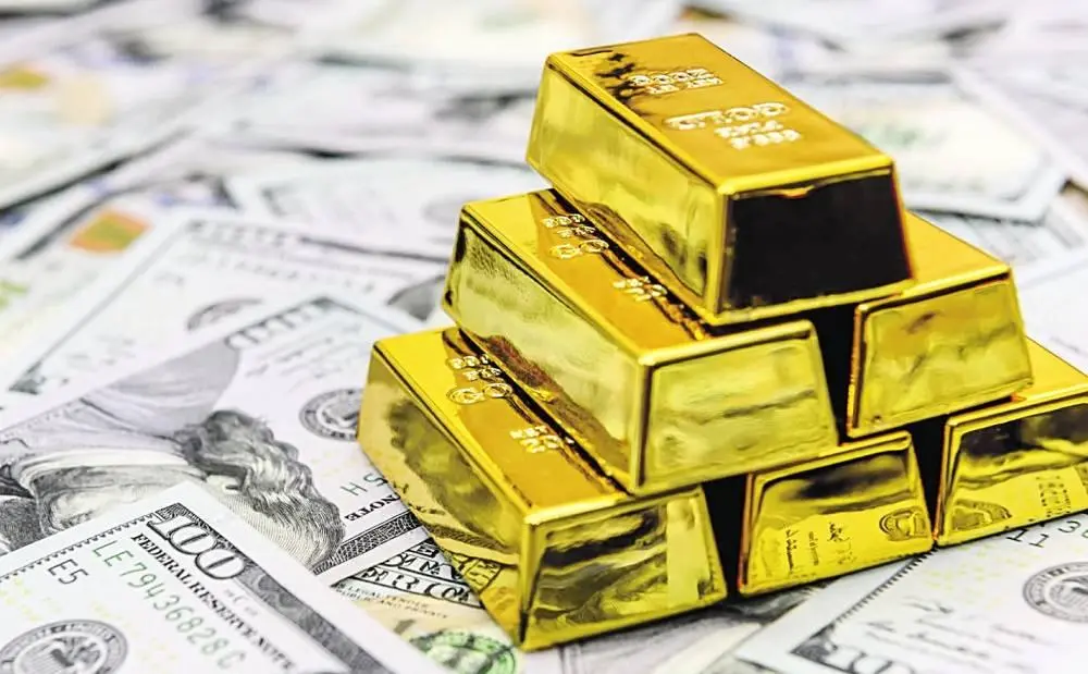 الذهب يتراجع بجني الأرباح وصعود الدولار